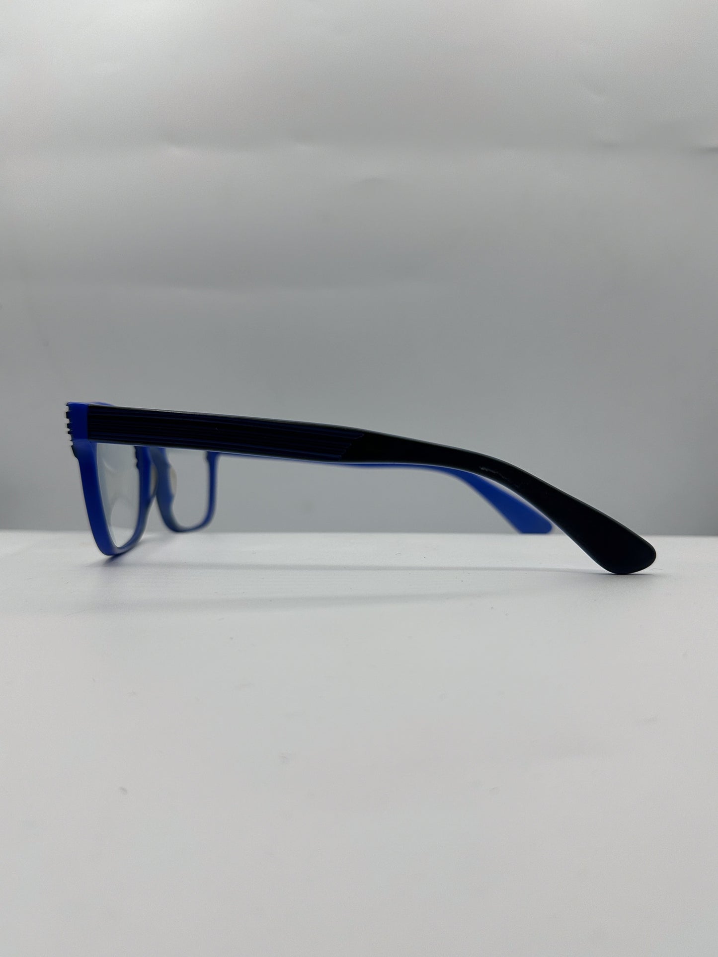 Blue 1990s SEE Eyeglasses left side