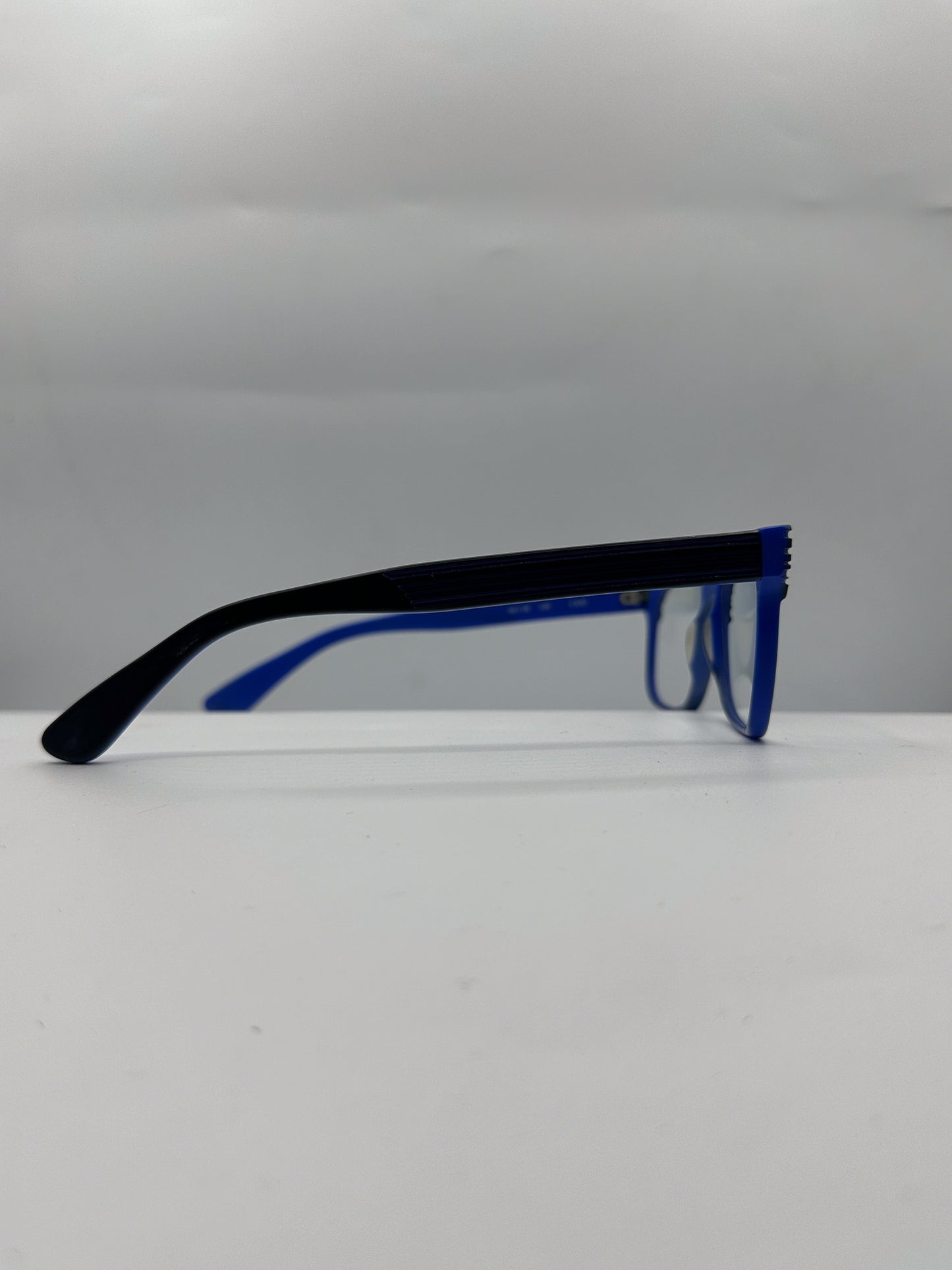 Blue 1990s SEE Eyeglasses right side