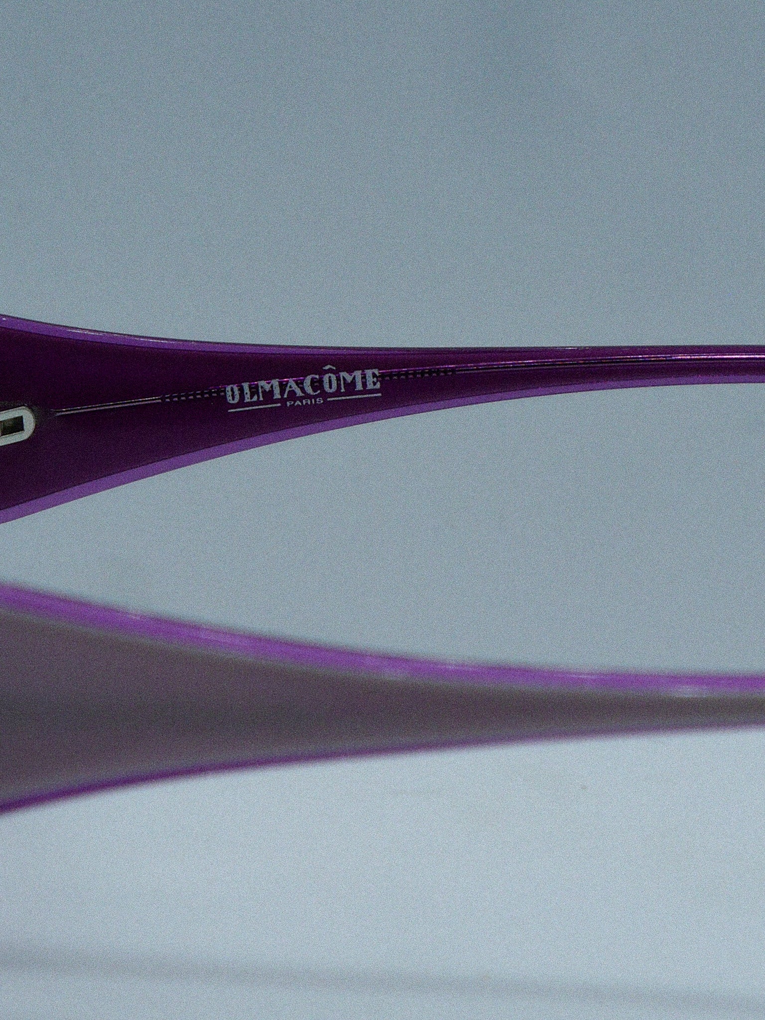 Butterfly 1960s Olmacome Sunglasses brand title