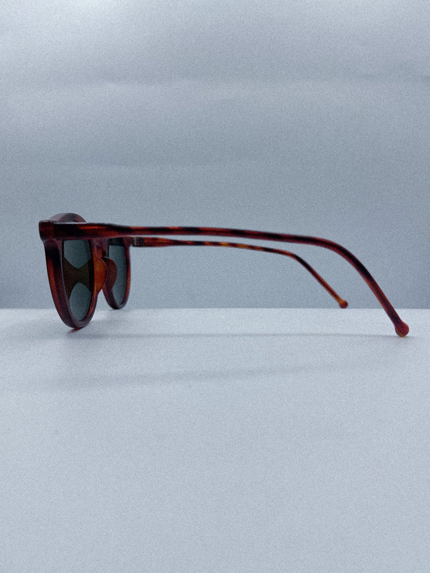 Curvy 1980s Designer Sunglasses left side