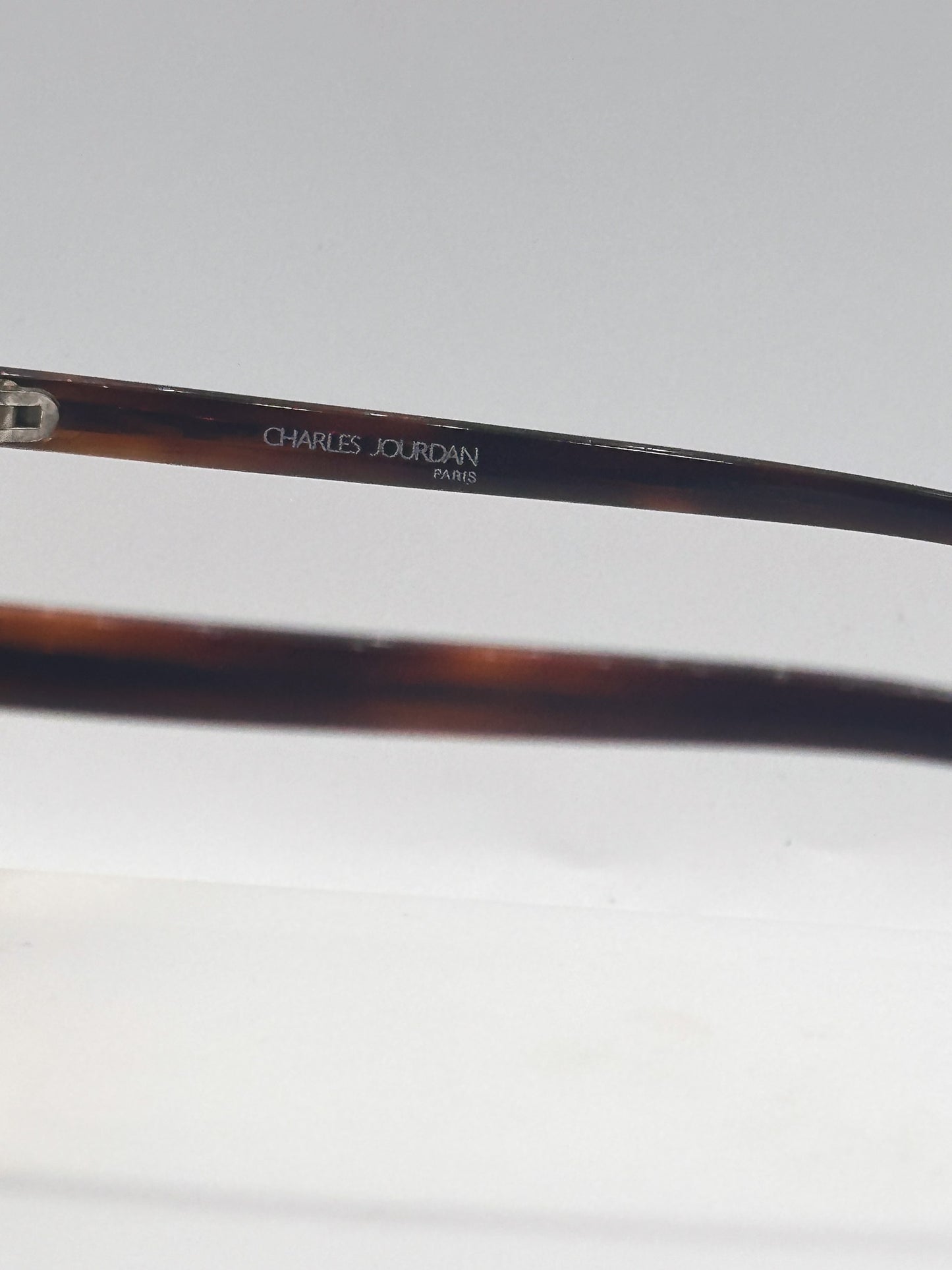 Dancing Feet 1970s Charles Jourdan vintage sunglasses, in side