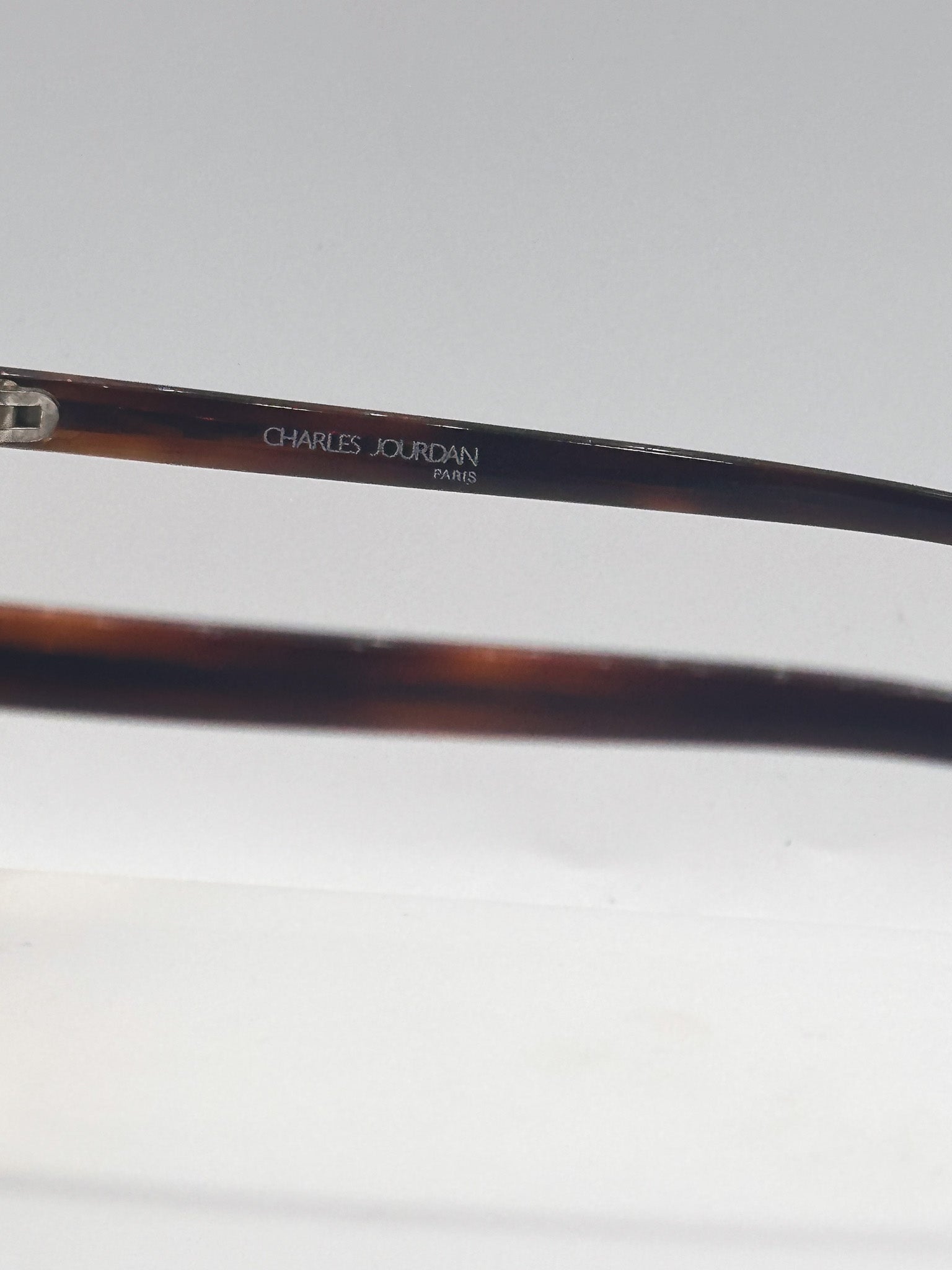 Dancing Feet 1970s Charles Jourdan vintage sunglasses, in side