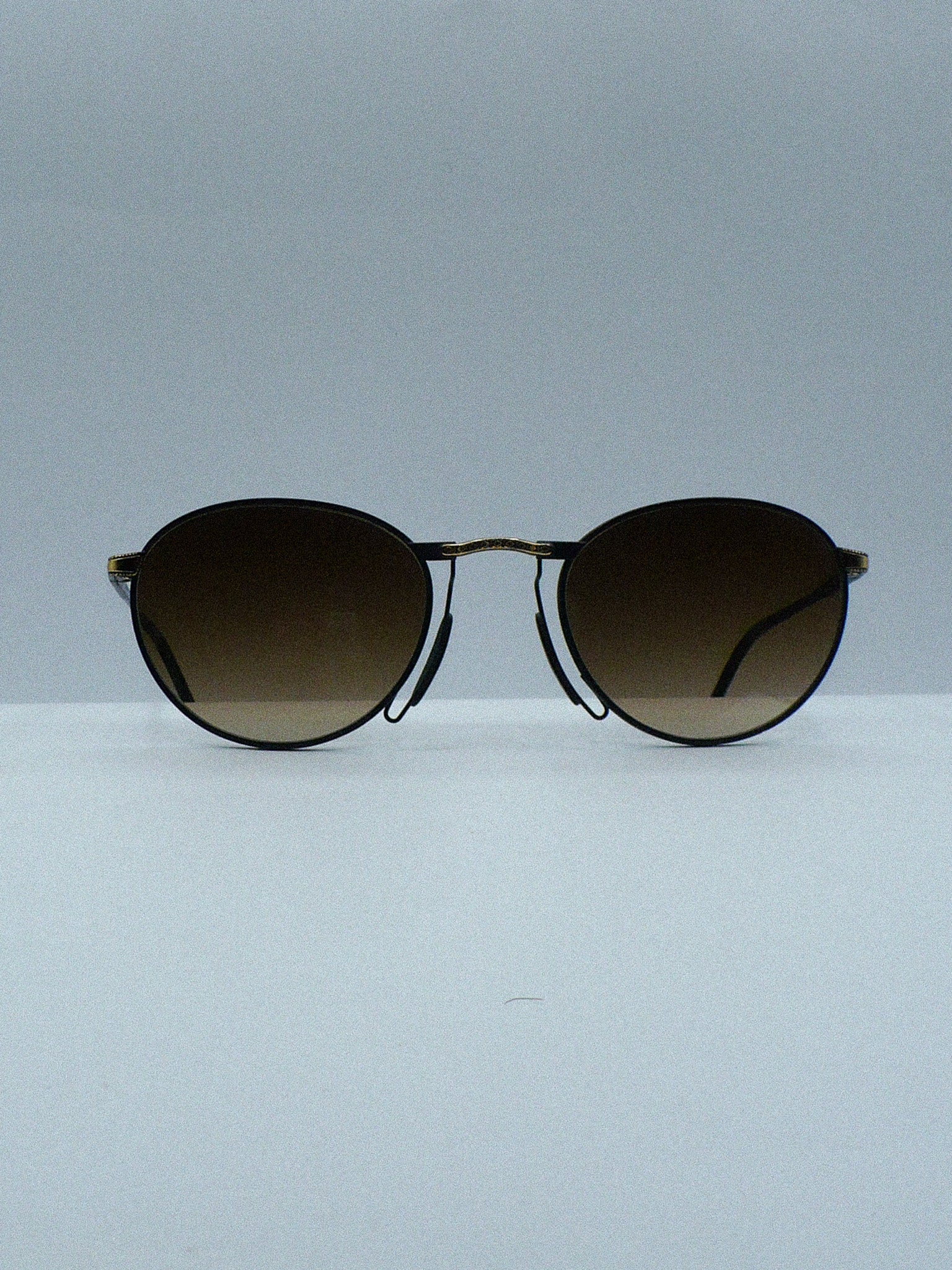 E Village 2000s Marcolin Luxury Sunglasses front side