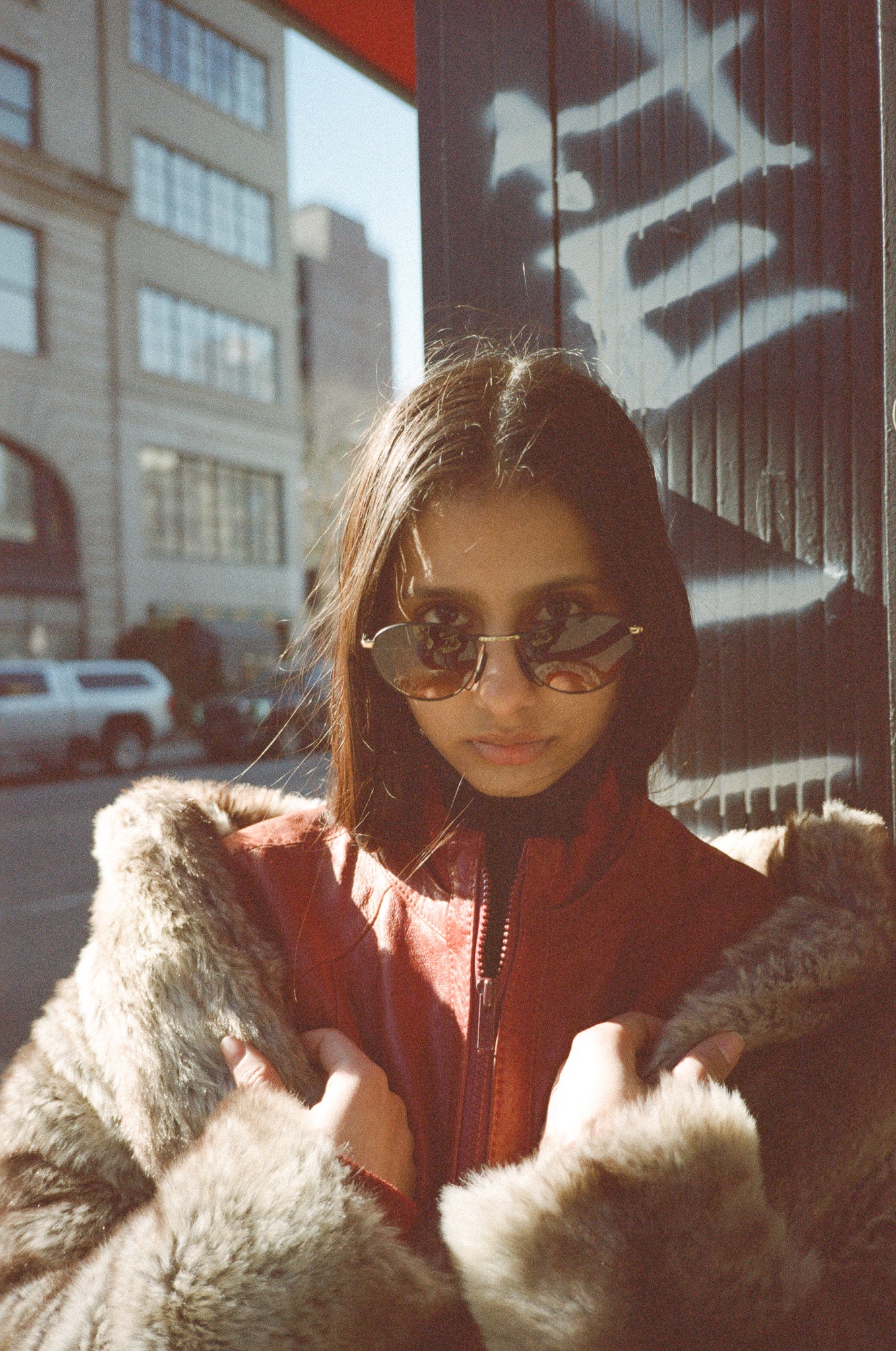 E Village 2000s Marcolin Luxury Sunglasses front side with model 2