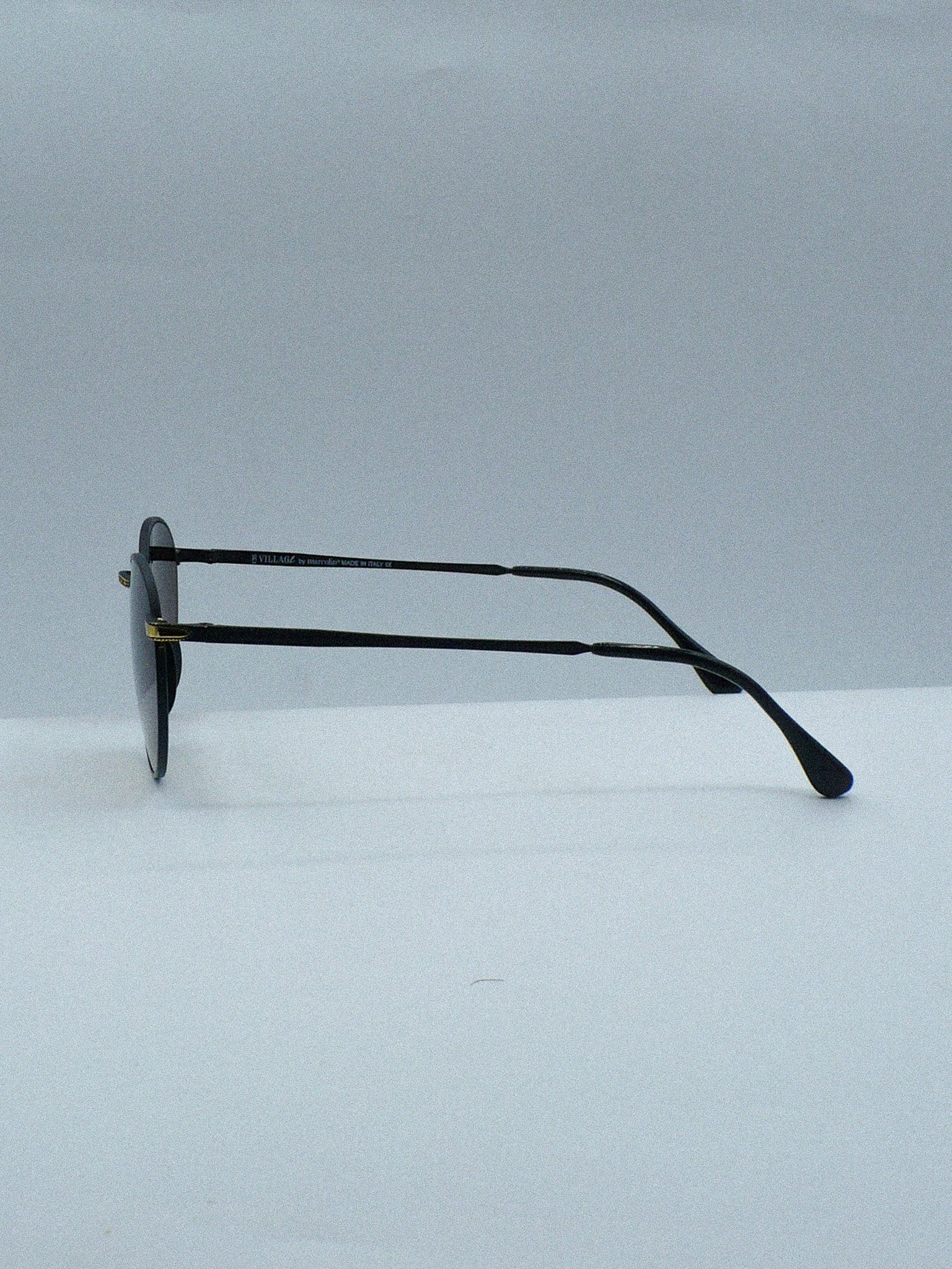 E Village 2000s Marcolin Luxury Sunglasses left side 2