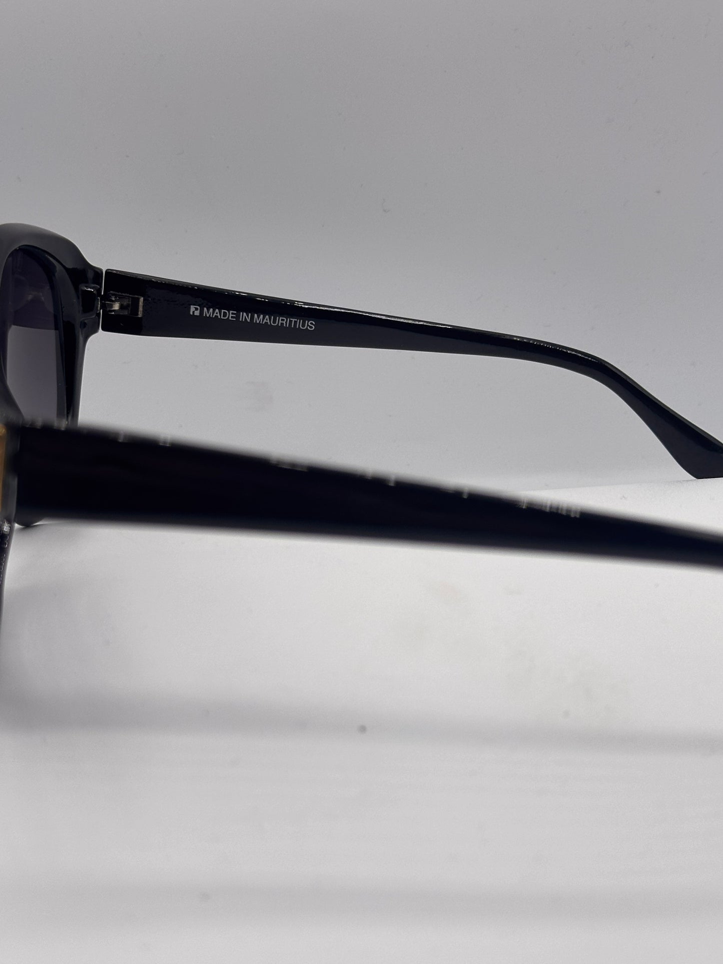 Global Connections 1980s vintage Sunglasses, inner left side
