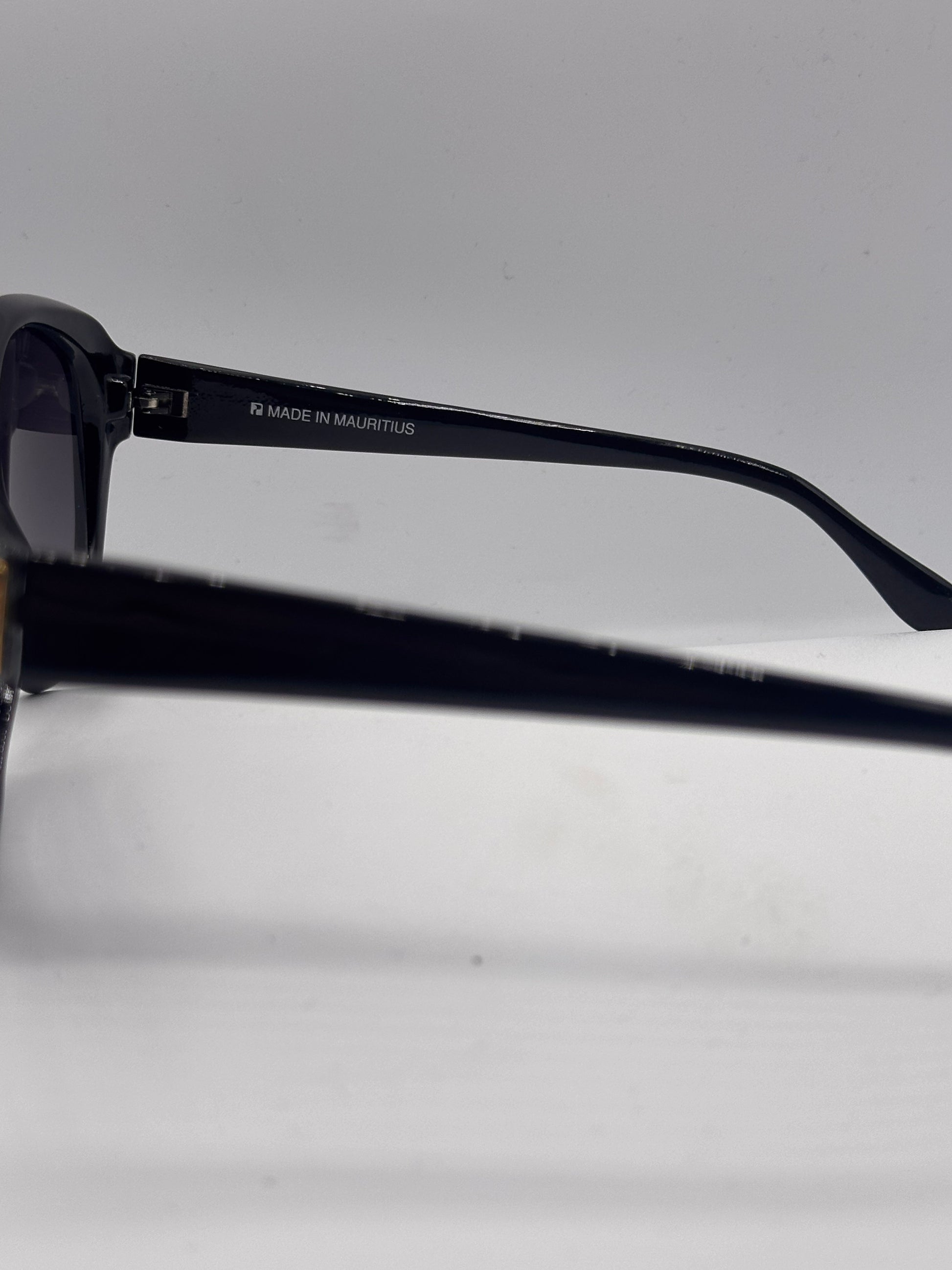 Global Connections 1980s vintage Sunglasses, inner left side