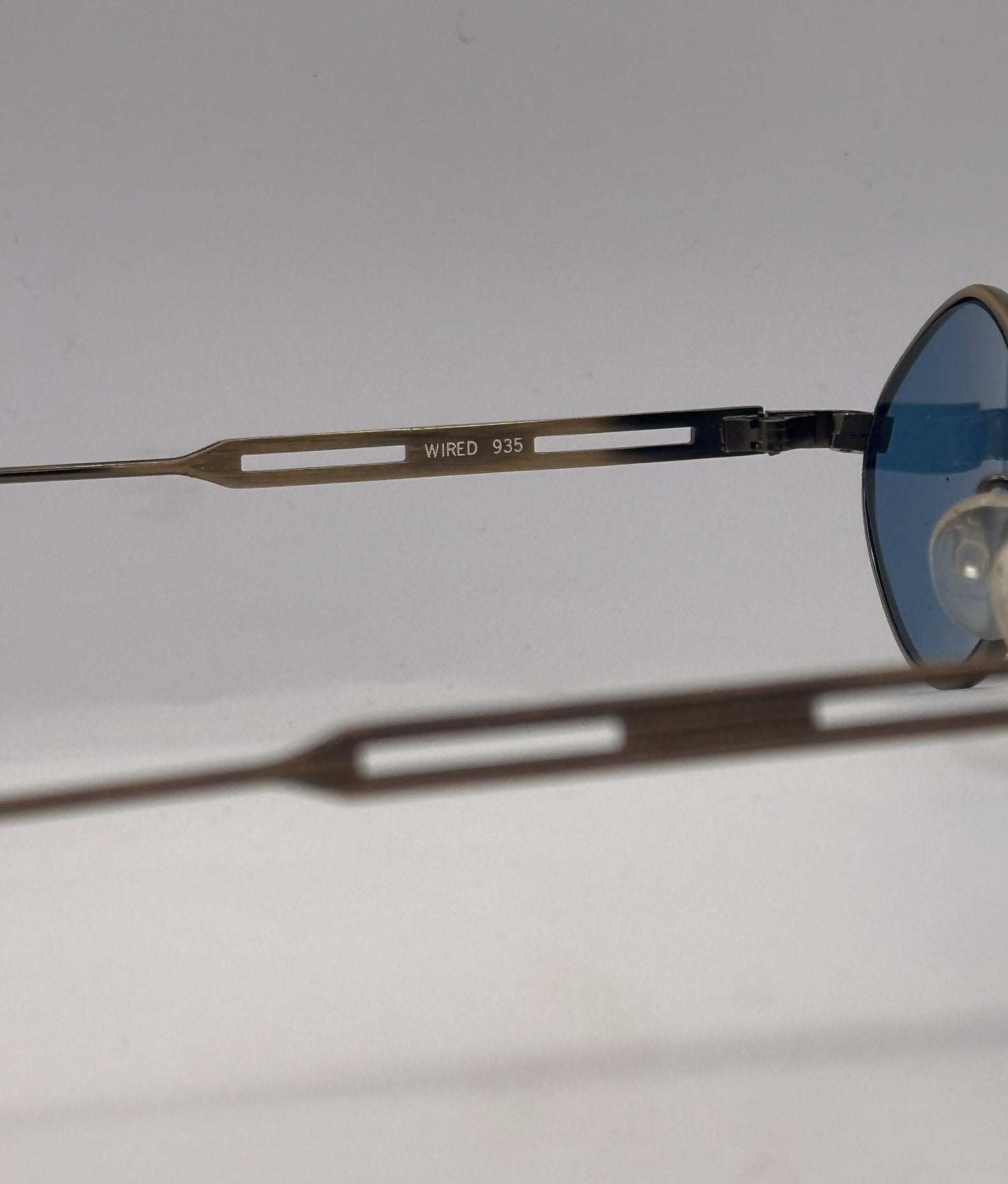 Matrix in Blue 1990s Wired Sunglasses, brand title