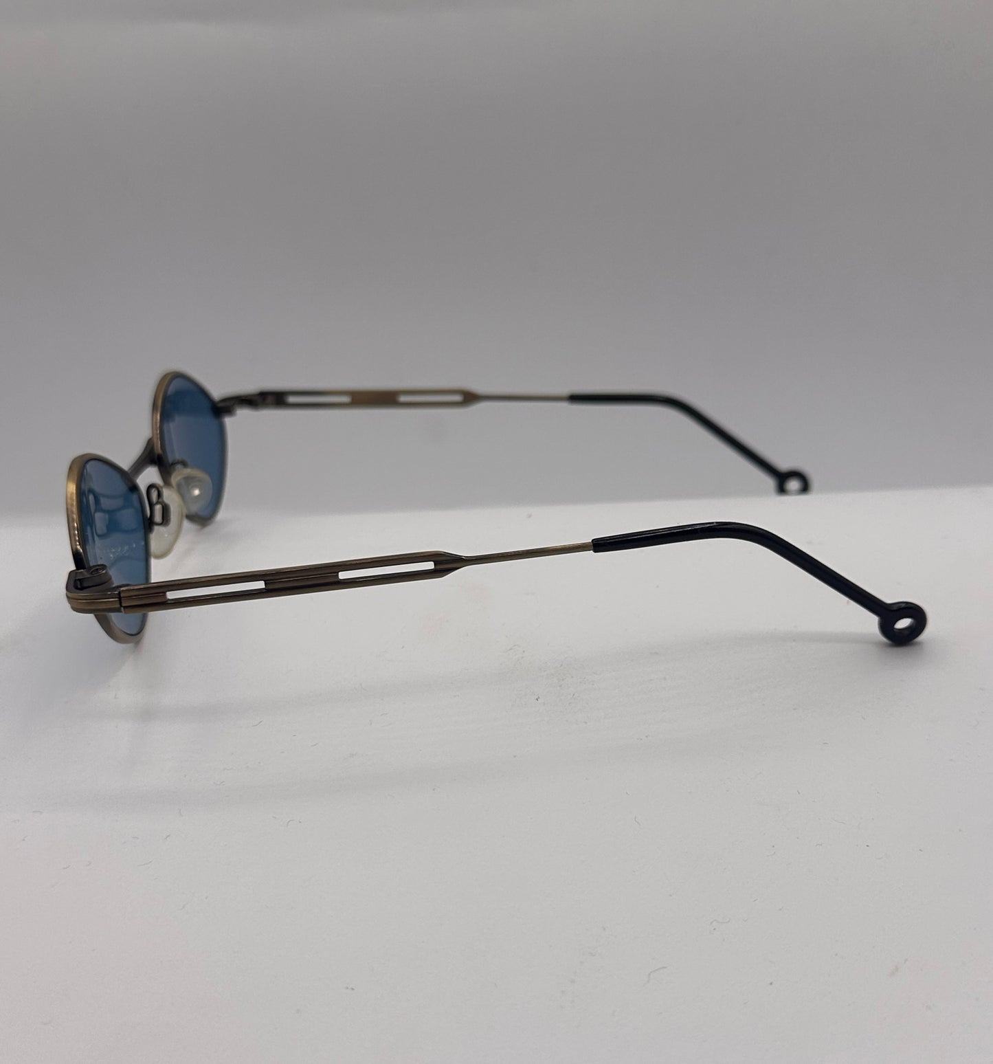 Matrix in Blue 1990s Wired Sunglasses, left side