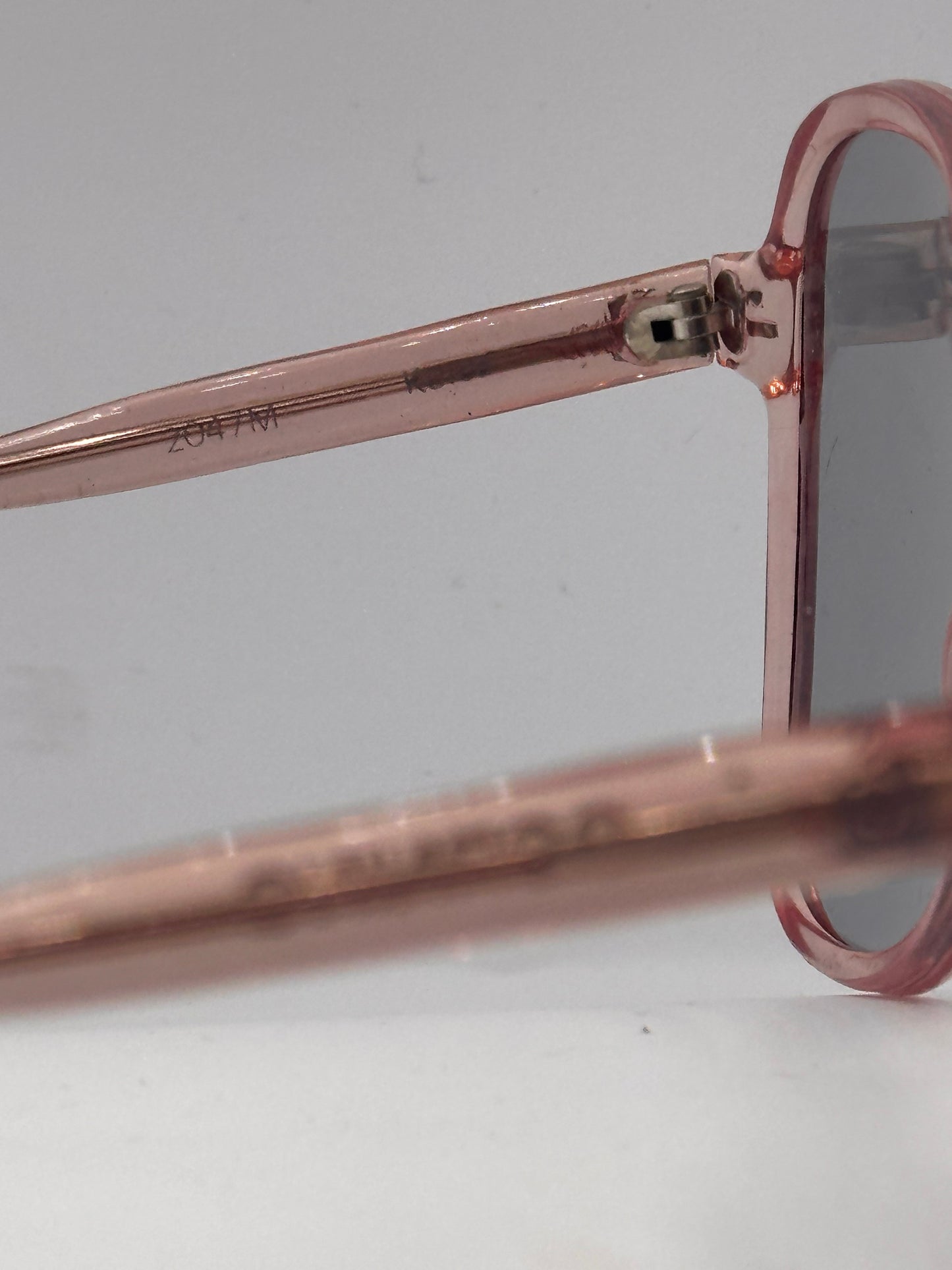 Pink Flowers 1970s Corning Sunglasses, brand title