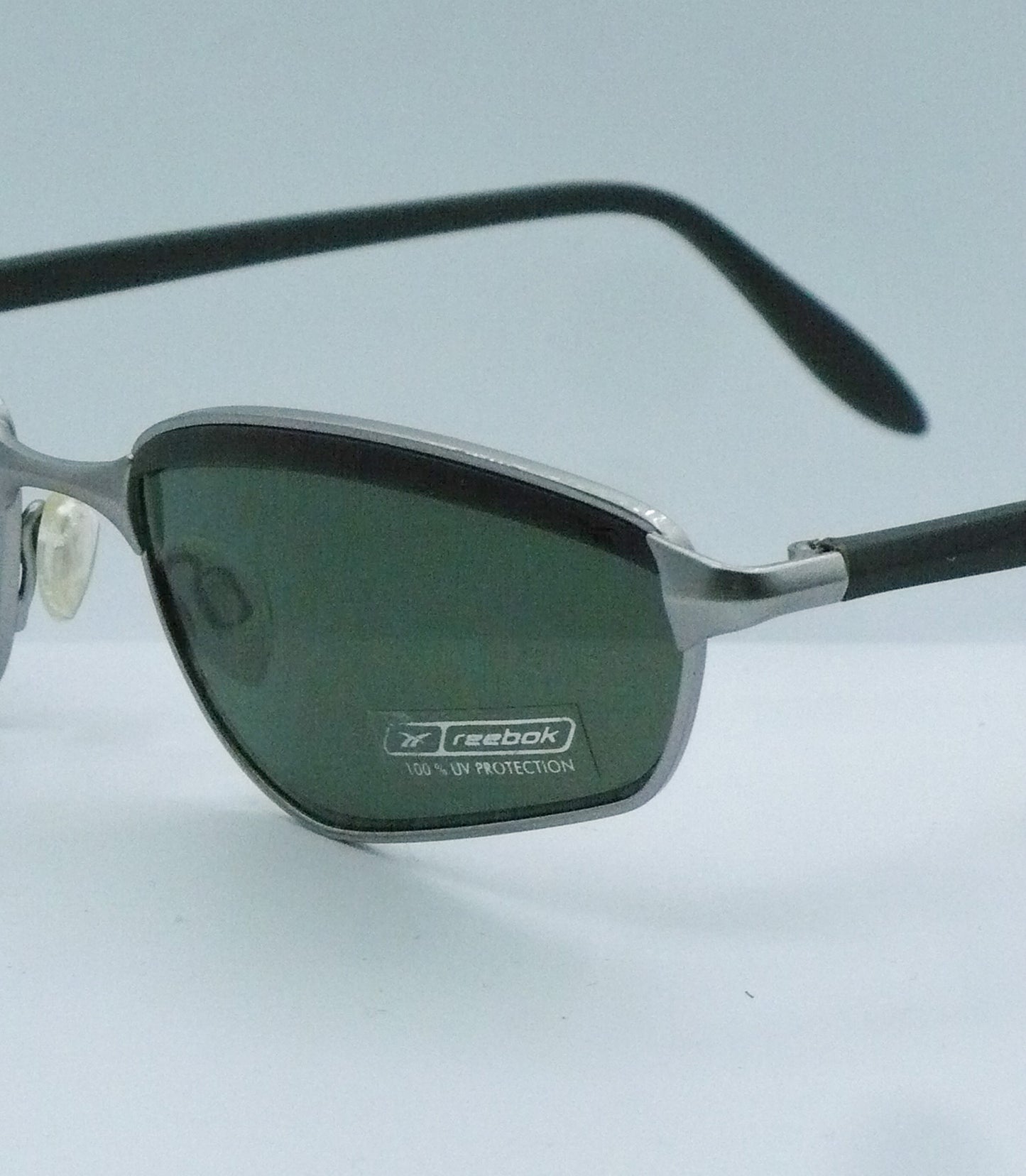 Sporty Reebok Sunglasses brand title
