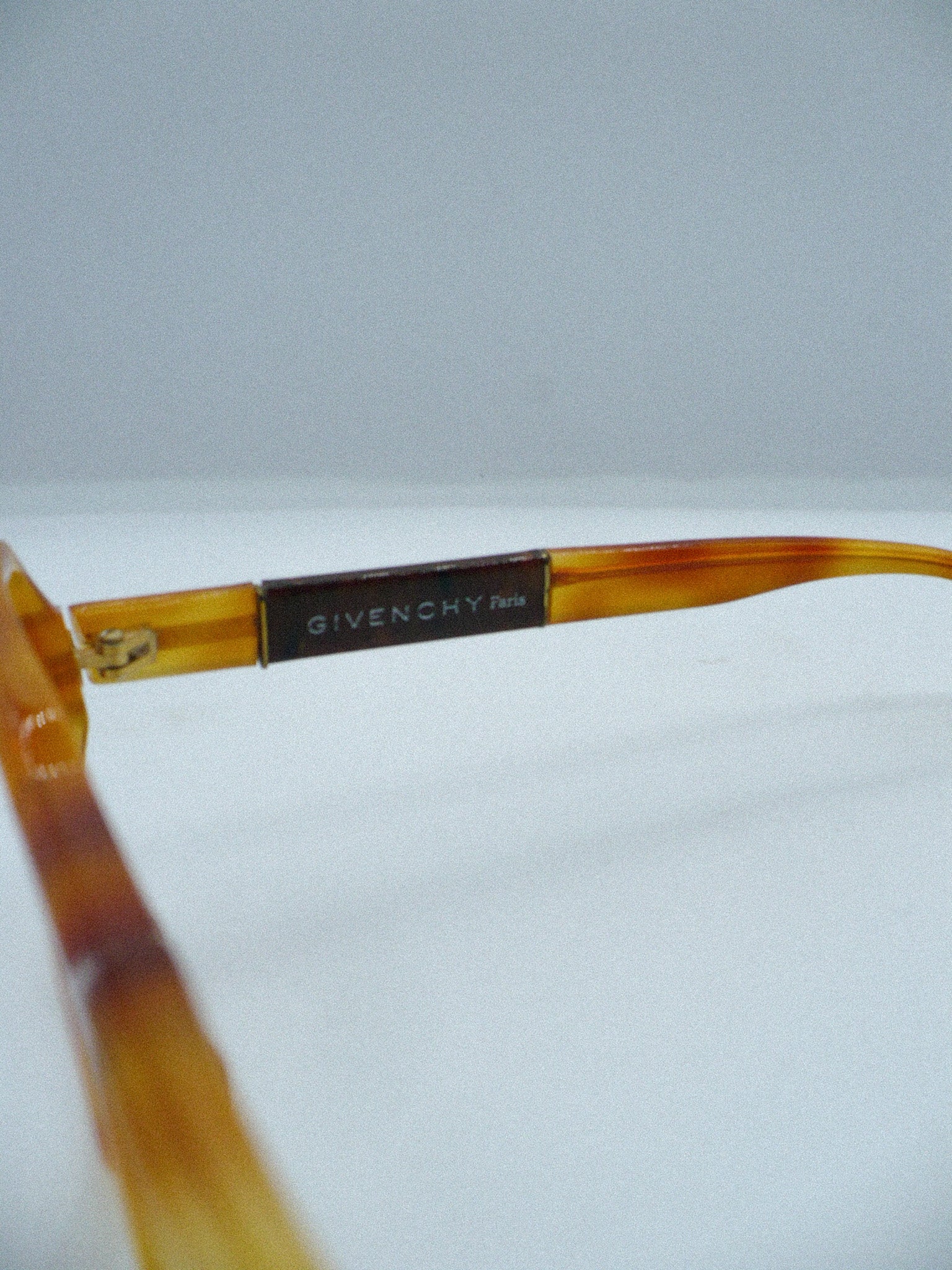 Studded 1980s Givenchy Luxury Frames brand title