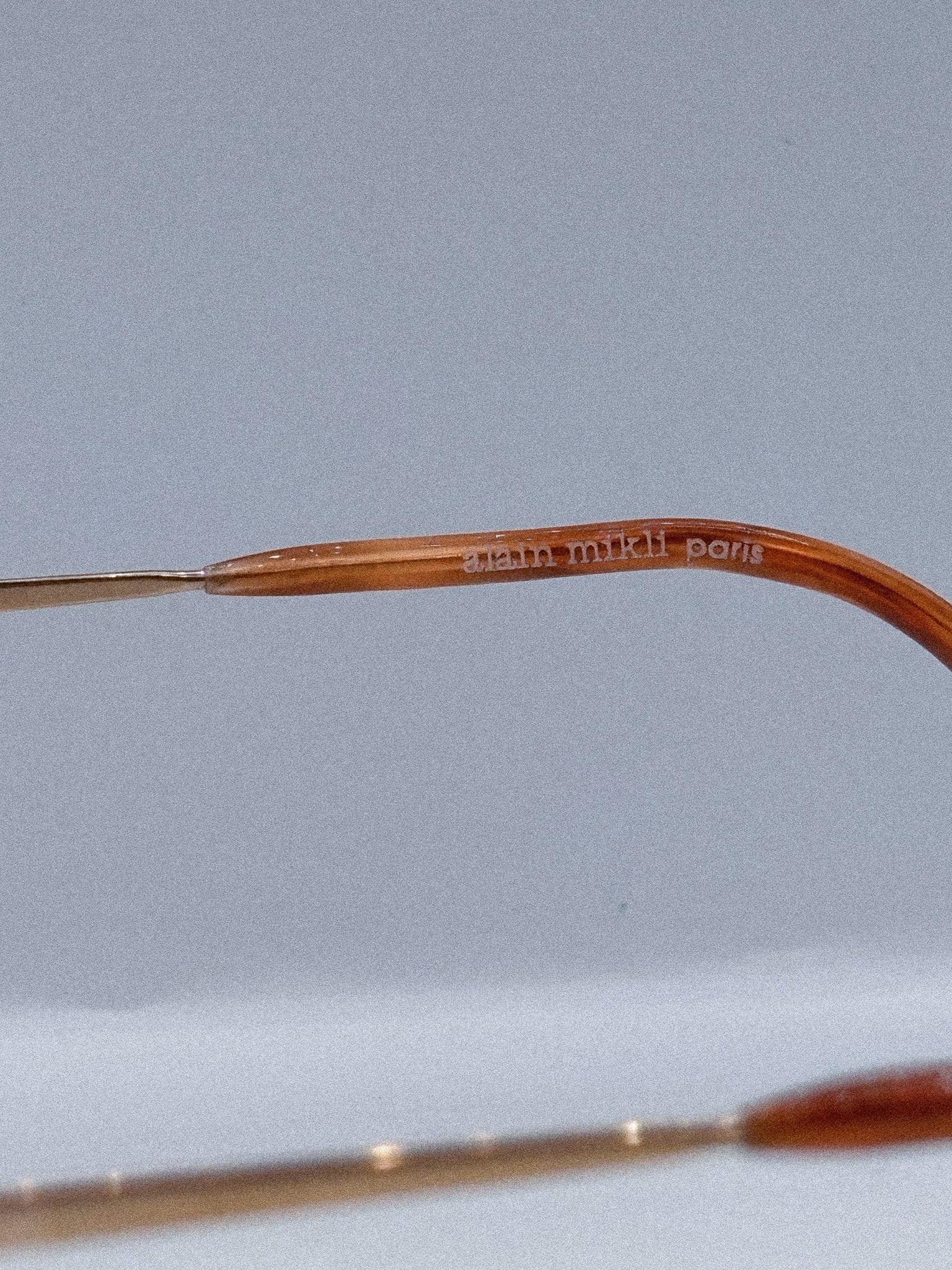 
 Art  1980s Alain Mikli Sunglasses brand title
