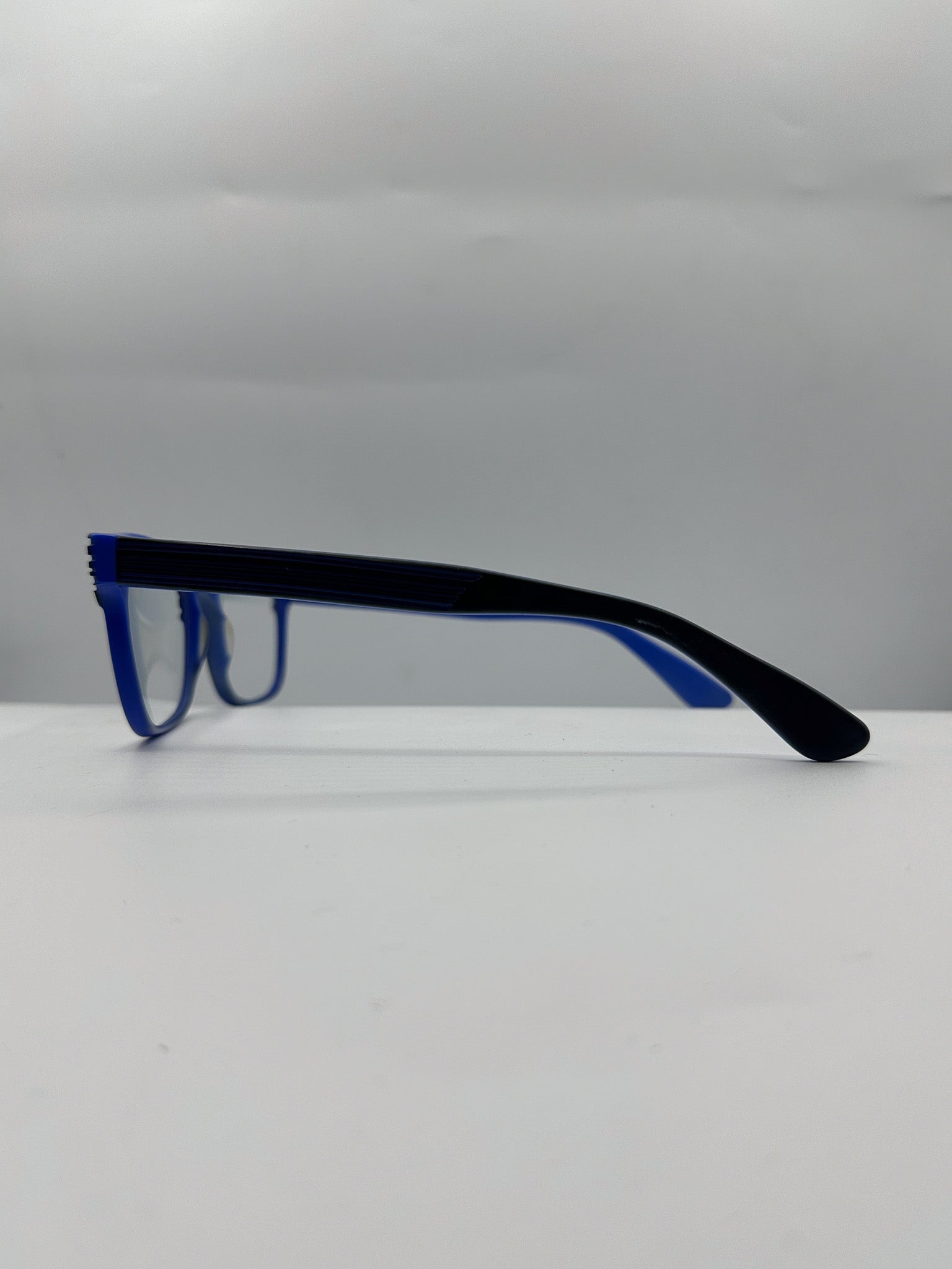 Blue 1990s SEE Eyeglasses left side