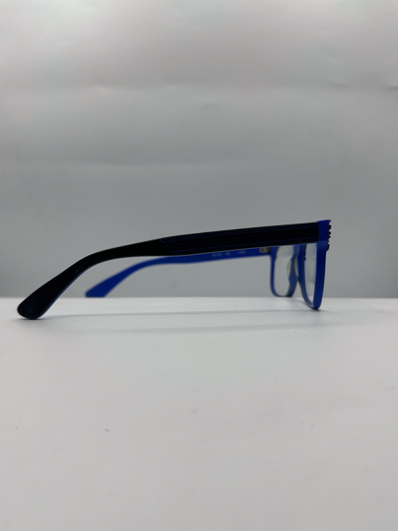Blue 1990s SEE Eyeglasses right side