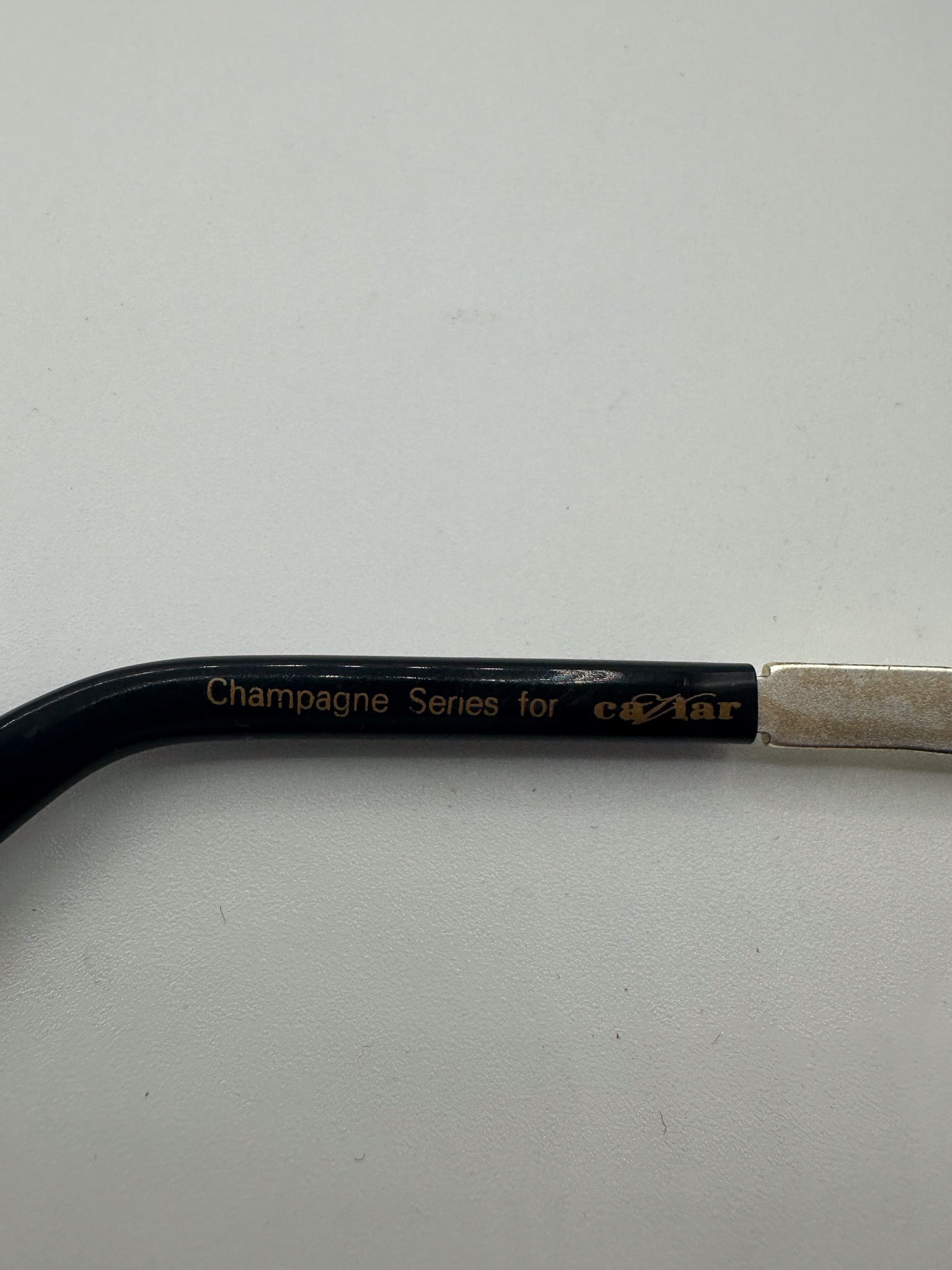 Champagne  1980s Caviar Sunglasses brand title