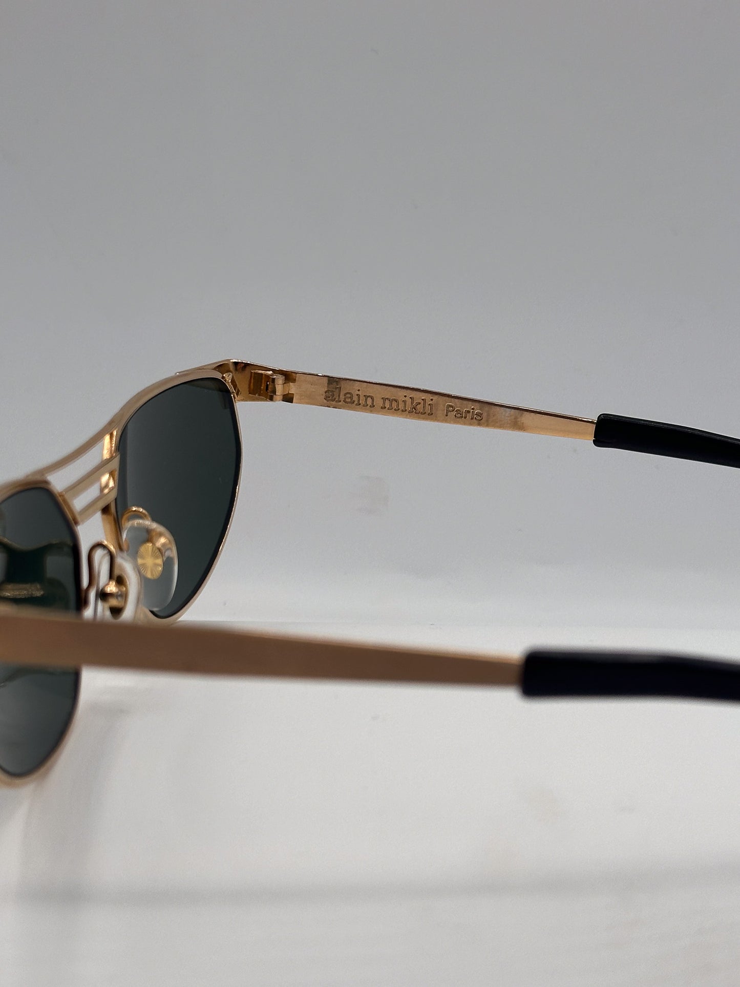 Retro Gold 1980s Alain Mikli vintage glasses gold frame, left side 2